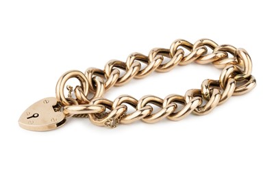 Lot 22 - A 9ct gold curb link bracelet, with padlock...