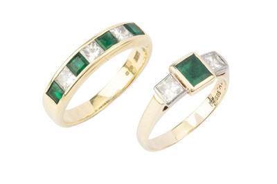 Lot 339 - An emerald and diamond seven stone dress ring,...