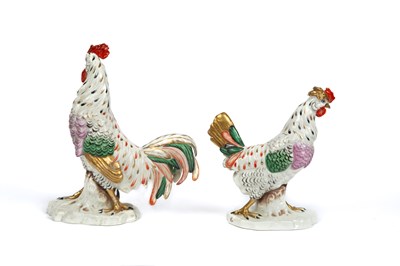 Lot 27 - A pair of Continental pottery figures of a cockerel and a chicken