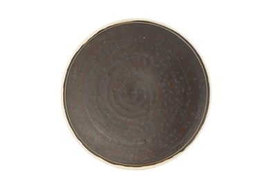 Lot 591 - Lucie Rie (1902-1995) Dish manganese glaze...