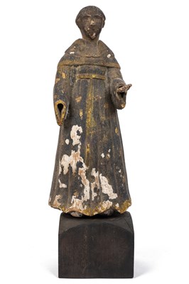 Lot 1055 - An antique carved and painted sculpture of a monk