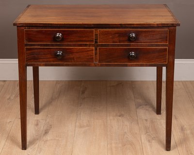 Lot 498 - A four-drawer mahogany side table