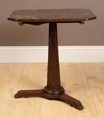 Lot 1100 - A rustic oak tilt-top table