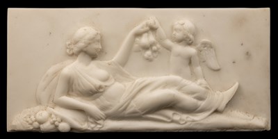 Lot 1231 - A marble tablet of Venus and Cupid together with a pair of marble plaques of putti