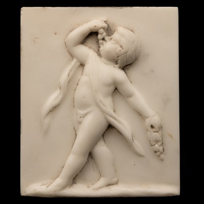 Lot 1231 - A marble tablet of Venus and Cupid together with a pair of marble plaques of putti