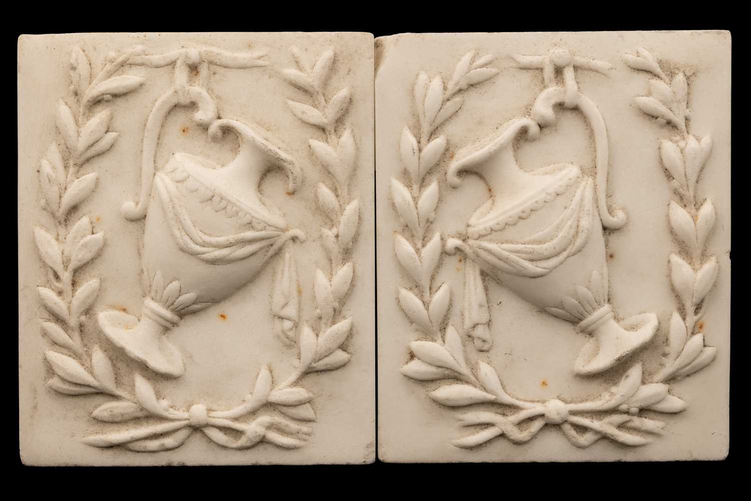 Lot 1235 - A pair of marble plaques