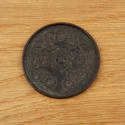 Lot 215 - Miniature iron mirror Japanese, late Meiji...