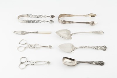 Lot 667 - A pair of mid 18th century silver sugar nips,...