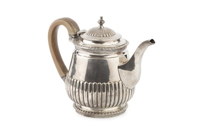 Lot 713 - A mid Victorian silver bachelor's teapot, with...