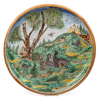 Lot 1076 - A decorative 19th century tin-glazed charger in the Renaissance style