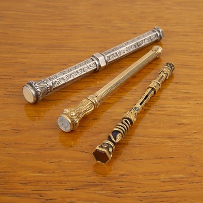 Lot 476 - Three propelling pencils one a gilt metal...