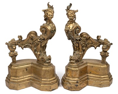 Lot 417 - A pair of French cast brass chenets