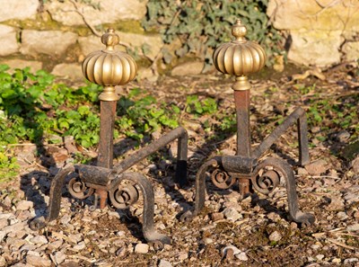 Lot 1182 - A pair of antique brass and wrought iron fire dogs