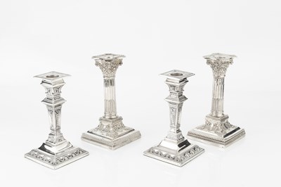 Lot 719 - A pair of late Victorian silver candlesticks,...