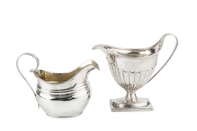 Lot 720 - A George III silver cream jug, with shaped...