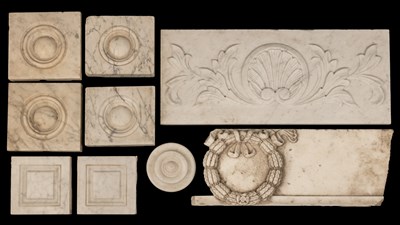 Lot A collection of carved marble chimneypiece tables and plaques