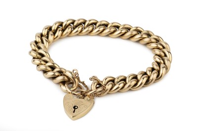 Lot A 9ct gold curb link bracelet, with...