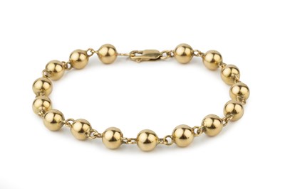 Lot 24 - A French 18ct gold bracelet, composed of ball...