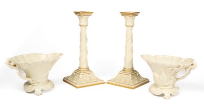 Lot 302 - A pair of Royal Worcester libation cups and a pair of candle sticks