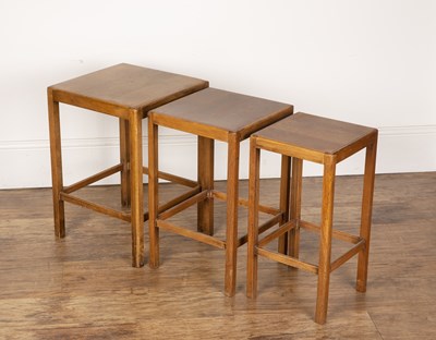 Lot 74 - Heals style oak, nest of three tables, with...