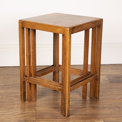 Lot 74 - Heals style oak, nest of three tables, with...