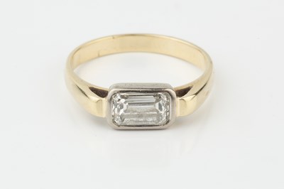 Lot A diamond solitaire ring, the emerald cut...