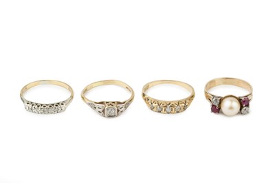 Lot 36 - An 18ct gold and diamond five stone ring, with...