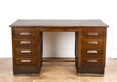 Lot 101 - 20th Century  oak, kneehole desk, fitted with...