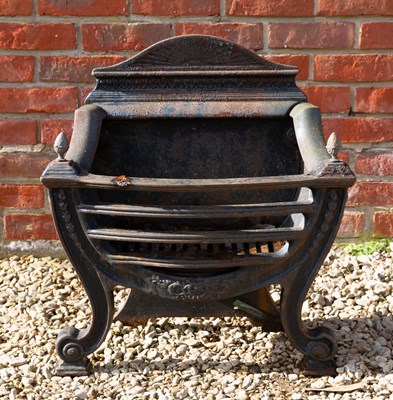 Lot 1326 - A Georgian style cast iron fire grate
