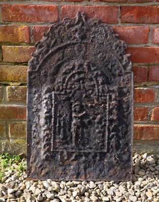 Lot 1185 - A cast iron fire back