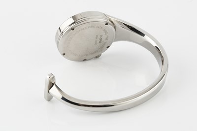 Lot A lady's steel bangle wristwatch by Georg...
