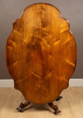 Lot 460 - A Victorian rosewood oval serpentine-topped looe table