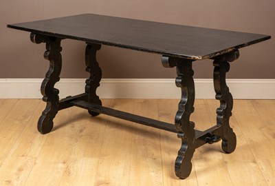 Lot 365 - A black painted oak Spanish style dining table