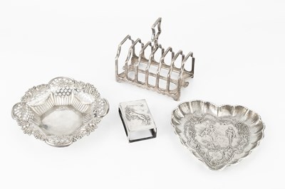 Lot 945 - A late Victorian silver seven bar toast rack,...