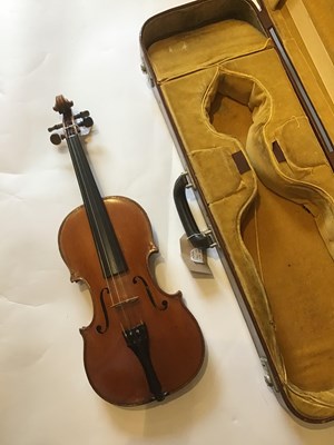 Lot 134 - A late 19th century violin with two piece back,...