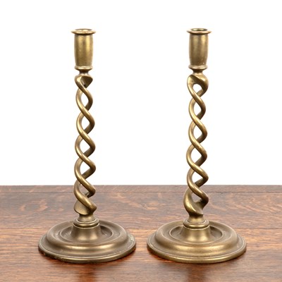 Lot 345 - Pair of brass candlesticks the stems spiralled,...