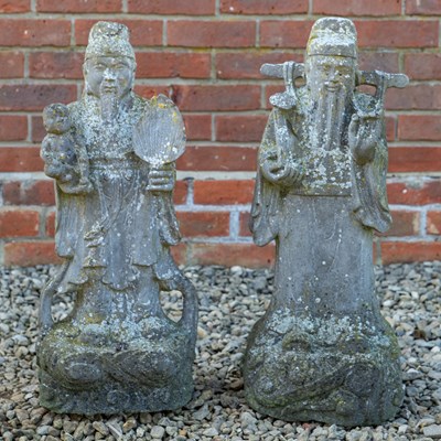 Lot 1323 - A pair of Chinese carved stone figures of immortals