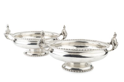 Lot 948 - A pair of George V silver twin handled serving...