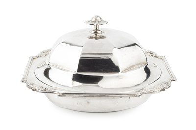 Lot 956 - An Edwardian silver muffin dish and cover, the...