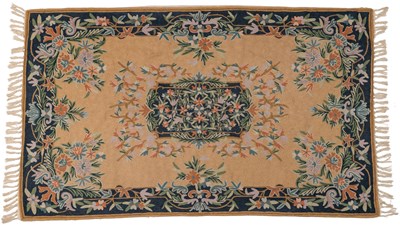 Lot 1006 - An Oriental needlework rug