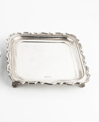 Lot 276 - A George V silver square salver, with shaped...