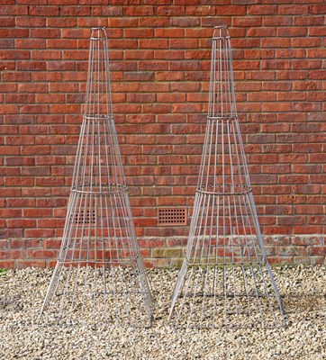 Lot 1335 - A pair of fish traps or plant supports