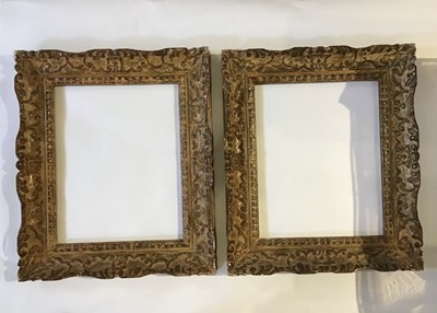 Lot 566 - A pair of giltwood and gesso frames, of rococo...