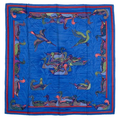 Lot 573 - A 'La Mare aux Canards' silk scarf by Hermès,...