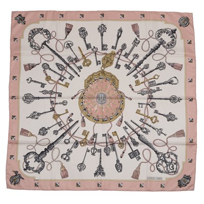 Lot 575 - A 'Les Clefs' silk scarf by Hermès, designed...