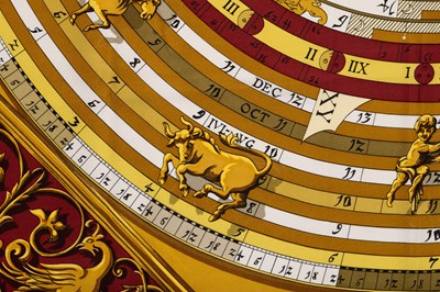 Lot 576 - An 'Astrologie Forever' silk scarf by Hermès,...