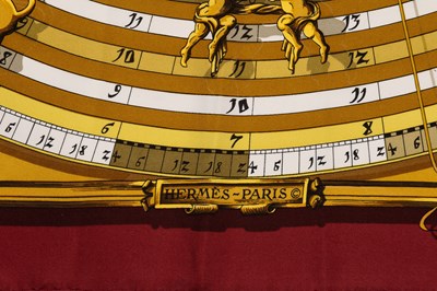 Lot 576 - An 'Astrologie Forever' silk scarf by Hermès,...