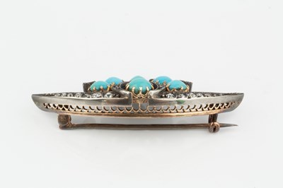 Lot 284 - A turquoise and diamond crescent brooch, set...