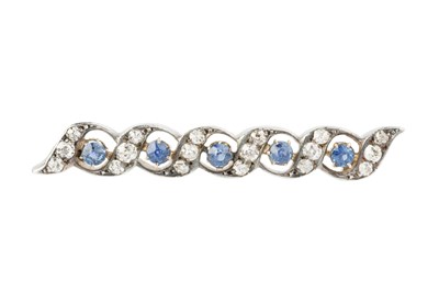 Lot 178 - A diamond and sapphire line brooch, of...