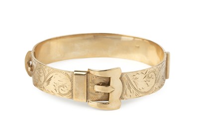 Lot 8 - A 9ct gold bangle, of hinged oval form,...